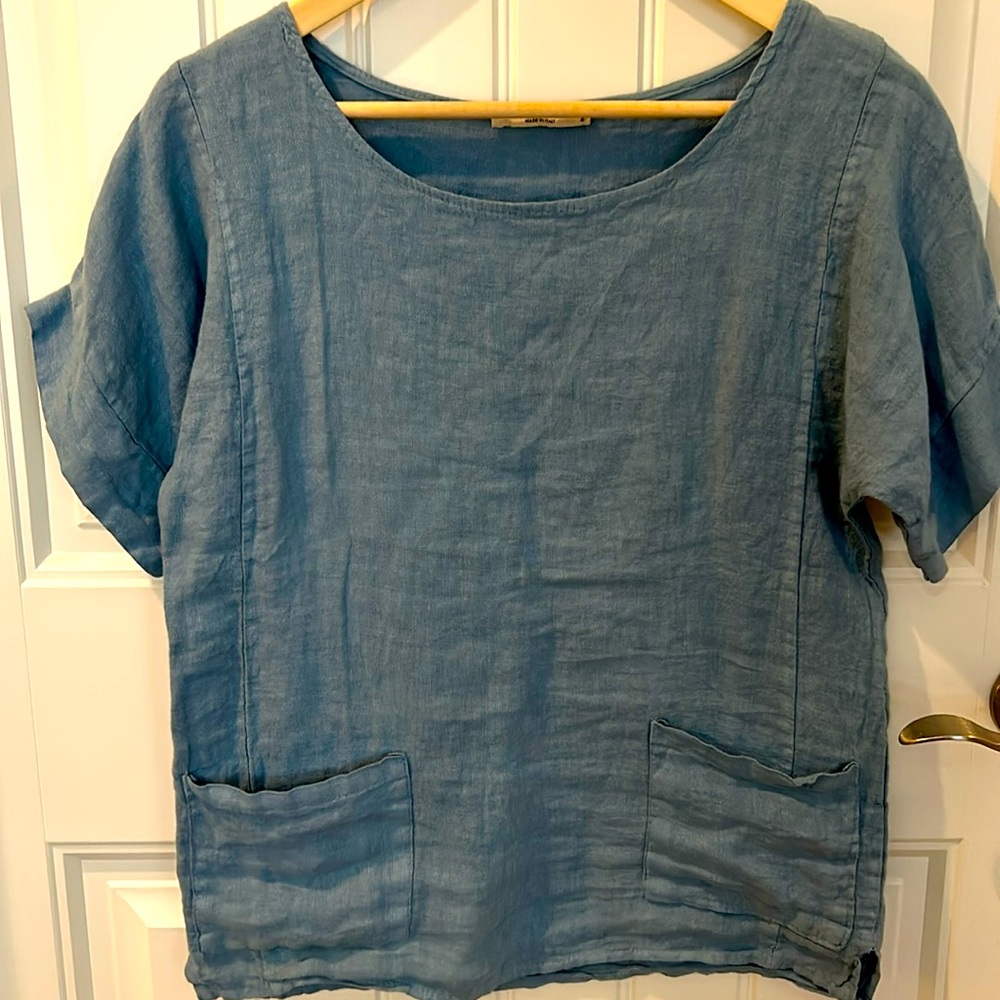 100% linen top. Beautiful shade of light blue. Size small